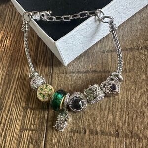Silver Charm Bracelet with Green and Purple Accents